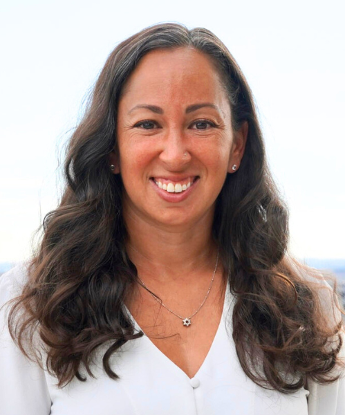 Debra Feinberg, Executive Director of Abrahamic House, smiling in a headshot.